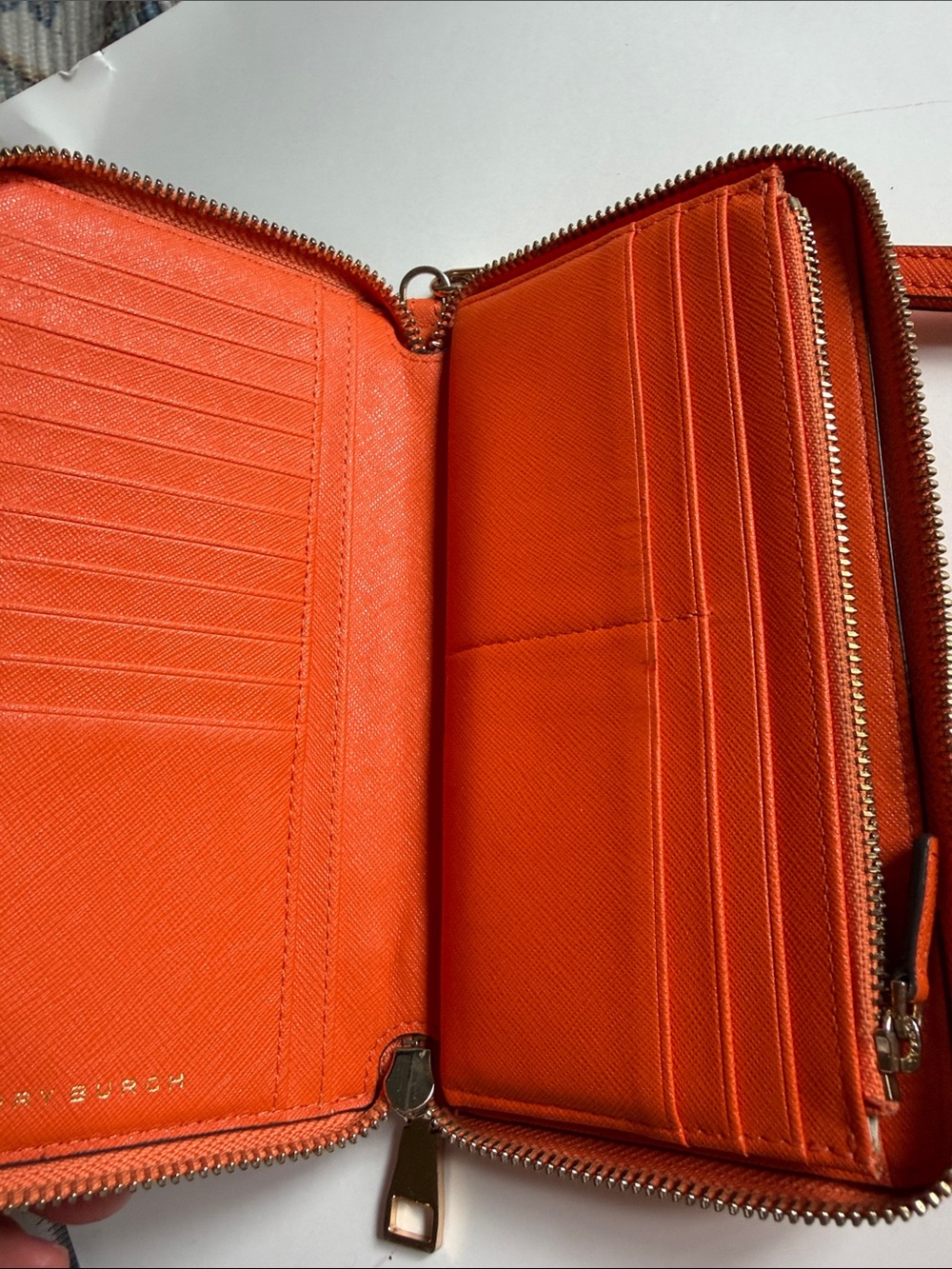 Tory Burch Bright Orange Zip Wallet with gold zipper